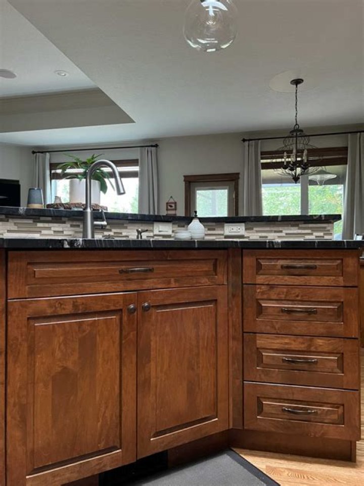 How do you strip kitchen cabinets without sanding?