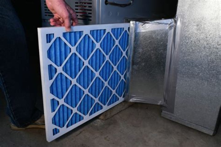 How many people does it take to replace a furnace?