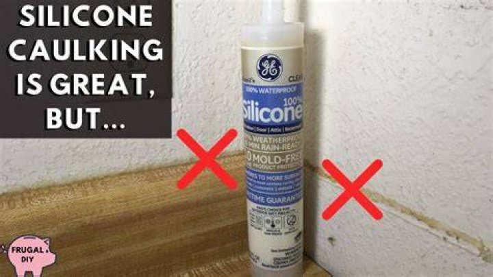 What does silicone caulk not stick to?