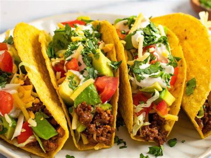 What is the singer tacos real name?